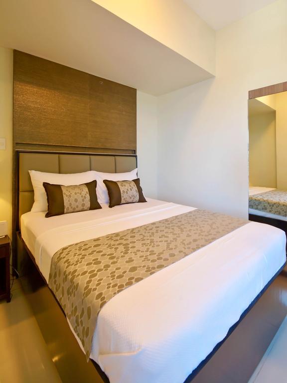 Currency Serviced Suites Manila Eksteriør bilde